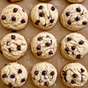A top-down view of High Altitude Chocolate Chip Cookies topped with sea salt