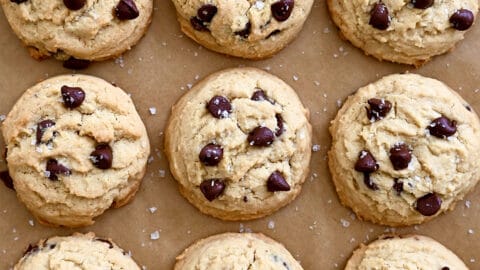 A top-down view of High Altitude Chocolate Chip Cookies topped with sea salt