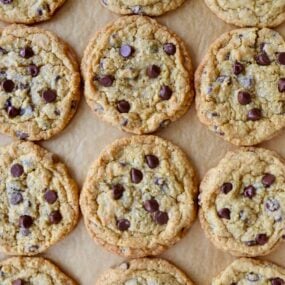 Top down view of Blended Oatmeal Chocolate Chip Cookies on parchment paper