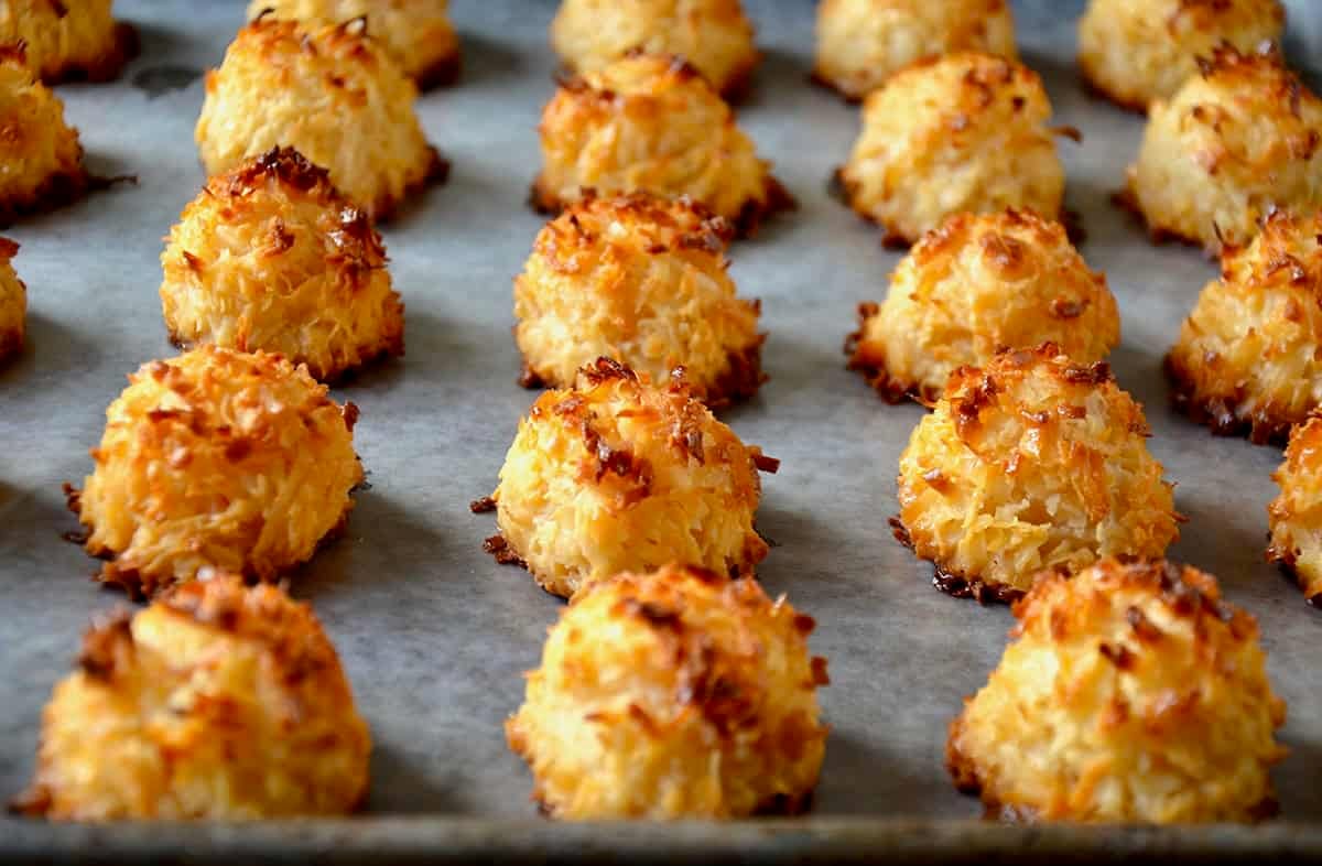 Perfectly golden coconut macaroons fresh out of the oven.