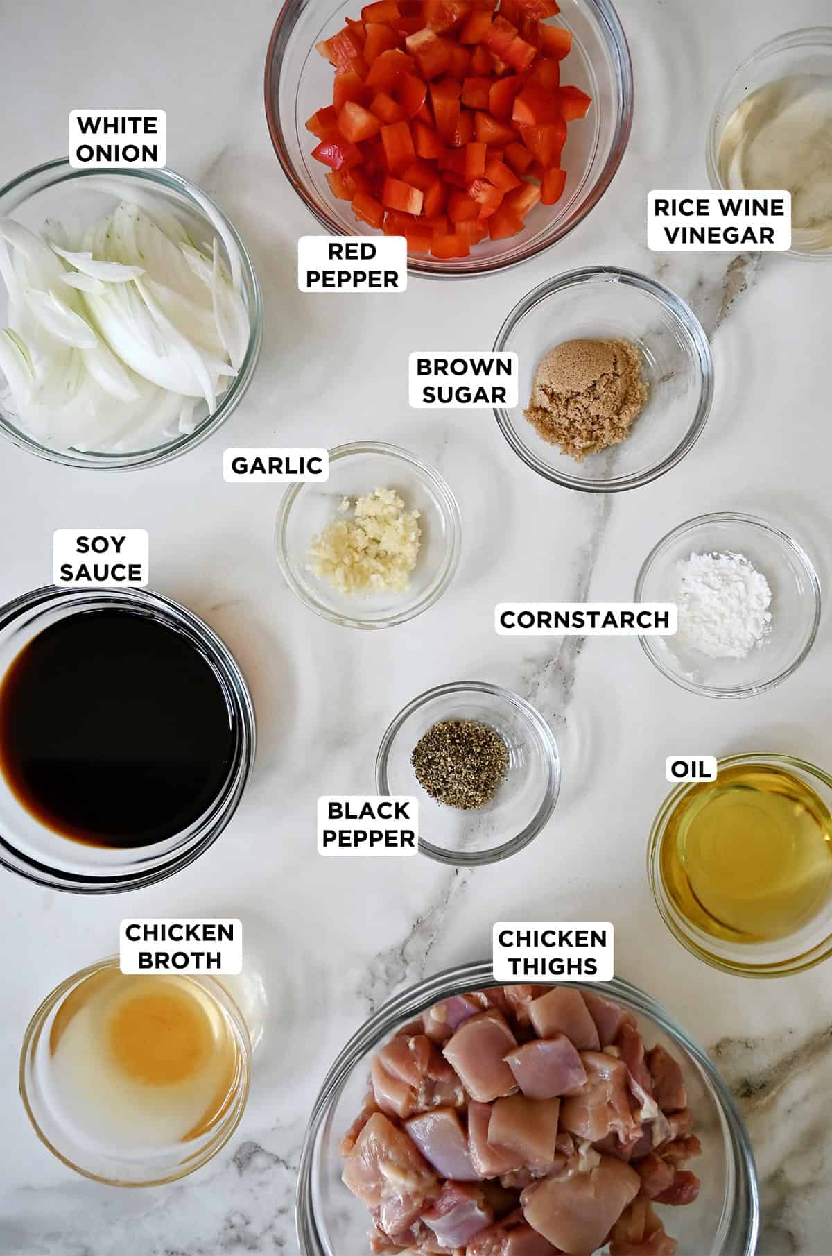Black pepper ingredients in various sizes of glass bowls.