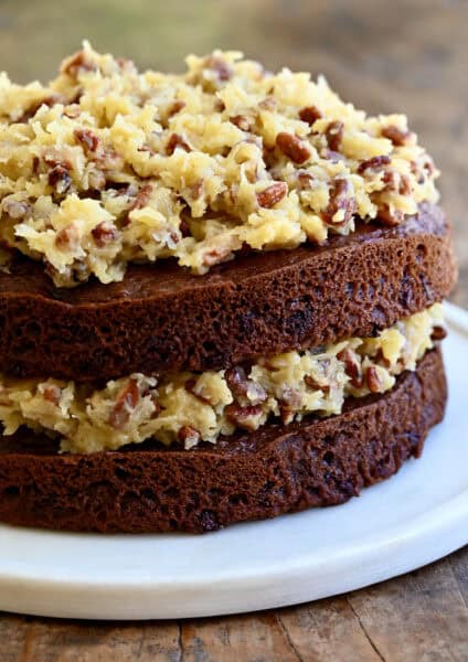 A two-layer German chocolate cake with a toasted pecan coconut frosting sandwiched between the layers.