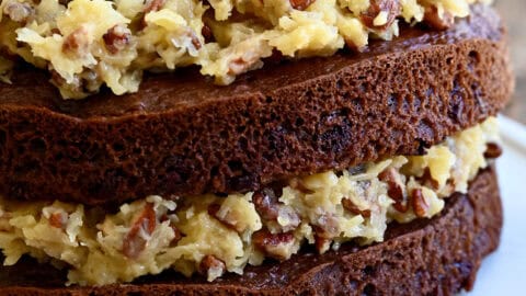 A two-layer German chocolate cake with a toasted pecan coconut frosting sandwiched between the layers.