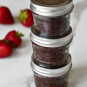 Stacked brownies in mini mason jars.