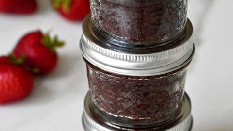 Stacked brownies in mini mason jars.