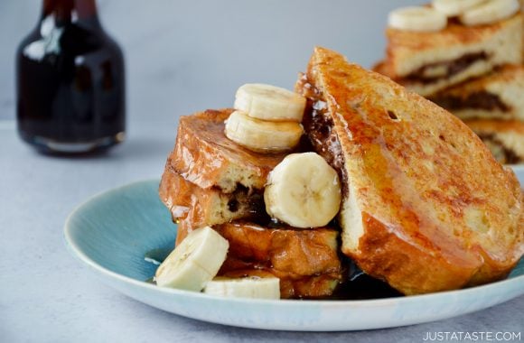 Easy Banana and Nutella Stuffed French Toast topped with banana slices