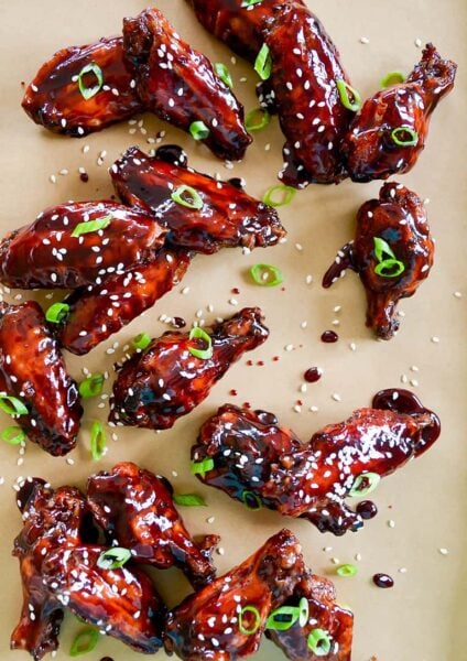 Crispy Baked Asian Chicken Wings topped with sesame seeds and chopped scallions