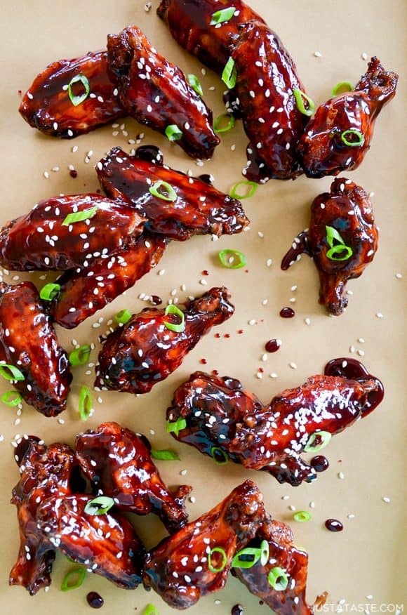 Crispy Baked Asian Chicken Wings topped with sesame seeds and chopped scallions