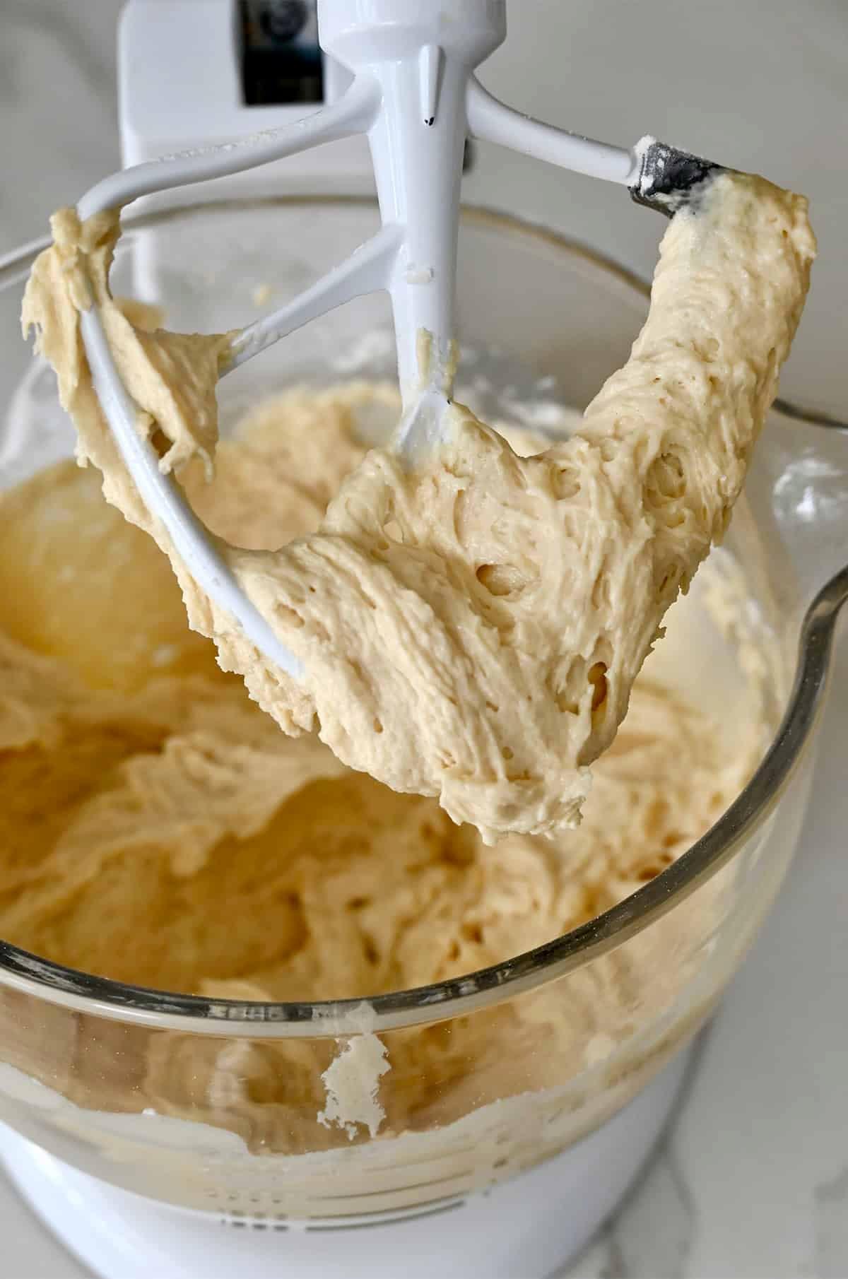 Sour cream coffee cake batter in a stand mixer bowl.
