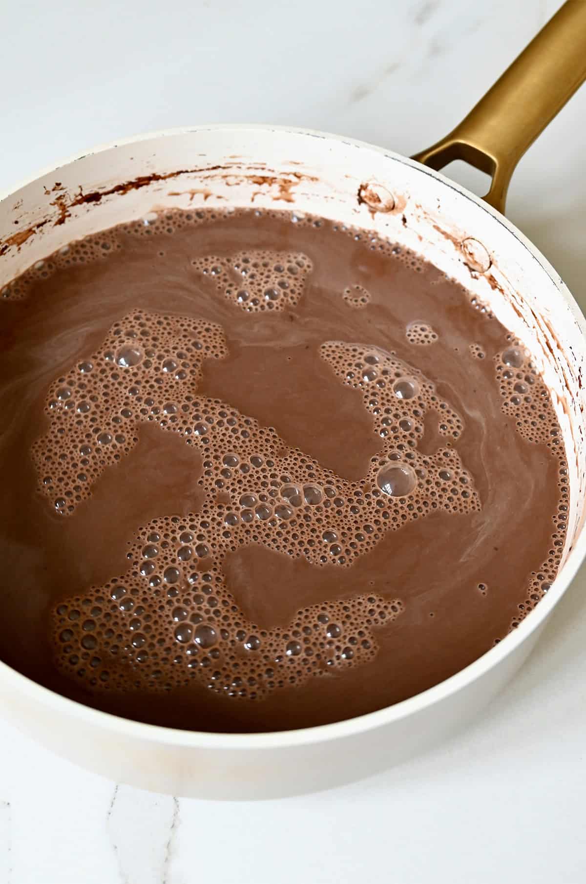 Chocolate popsicle mix in a saucepan.