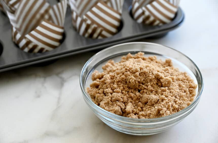 A small clear bowl containing streusel