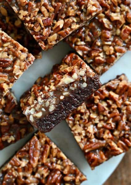 Fudgy pecan pie brownies with a thick layer of pecan pie filling.