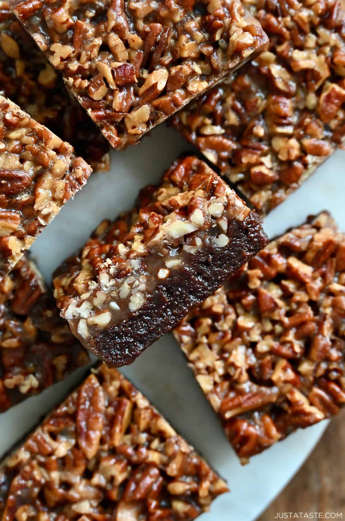 Fudgy pecan pie brownies with a thick layer of pecan pie filling.