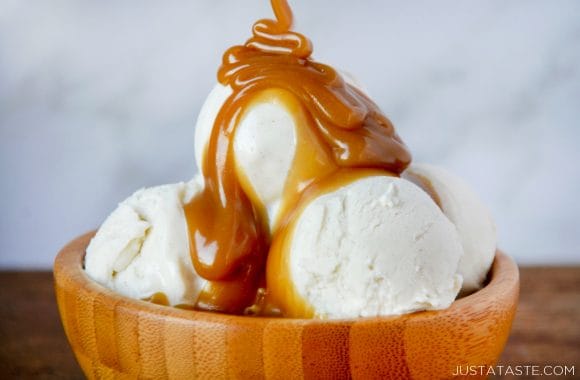 The best homemade butterscotch sauce over scoops of vanilla ice cream 