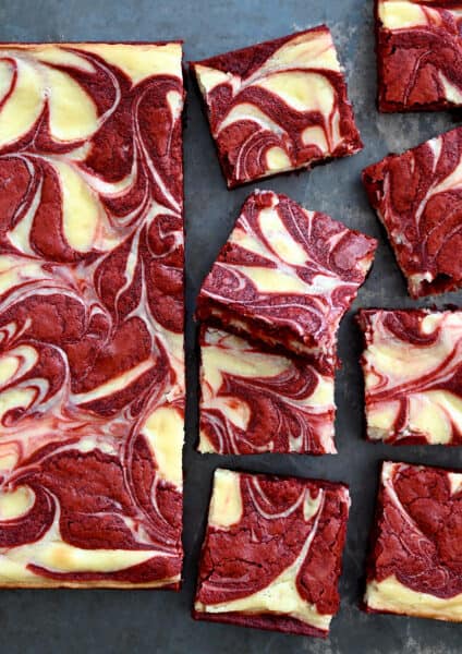 The best Red Velvet Cheesecake Brownies sliced into perfect squares