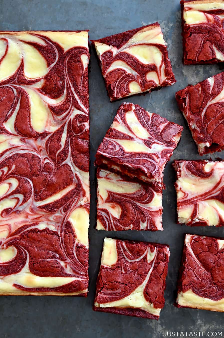 The best Red Velvet Cheesecake Brownies sliced into perfect squares