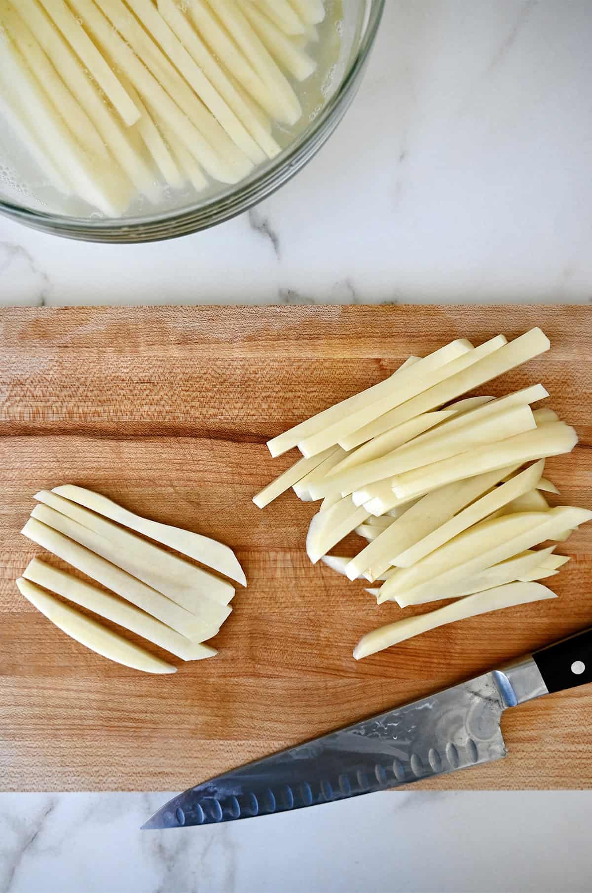 Potatoes cut into batons for French fries.