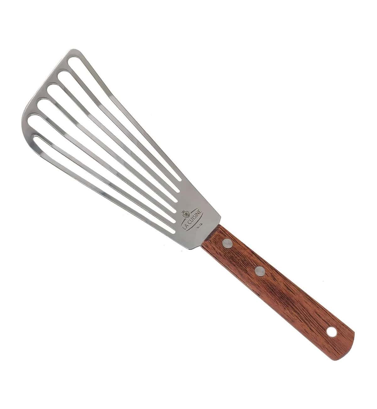 A metal fish spatula with a wooden handle.