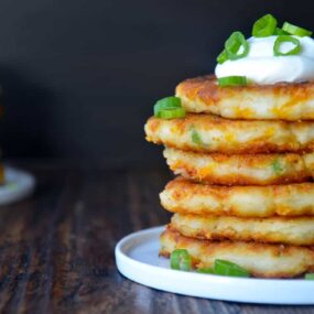 Cheesy Leftover Mashed Potato Pancakes from justataste.com #recipe