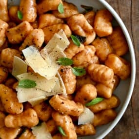 Homemade sweet potato gnocchi tossed in a brown butter sage and topped with crispy sage leaves and parmesan shavings.
