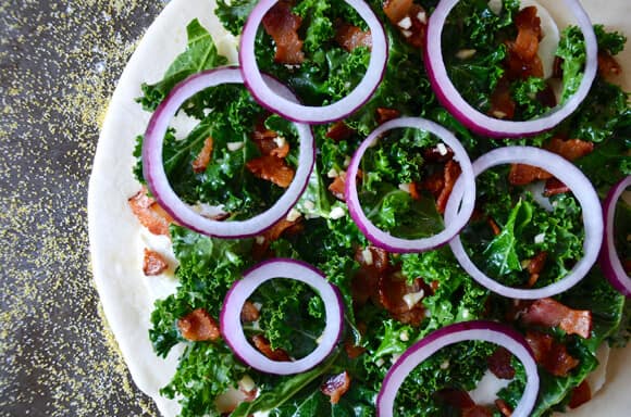 Garlicky Kale and Bacon Pizza from justataste.com #recipe