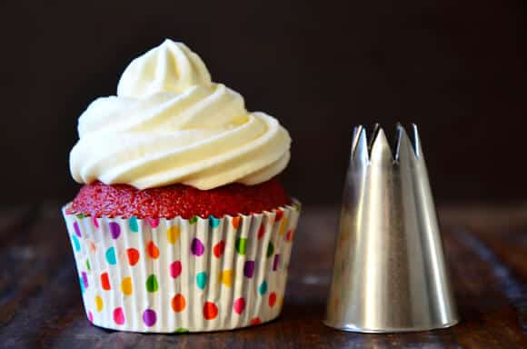 Red Velvet Cupcakes with Piped Cream Cheese Frosting from justataste.com #recipe