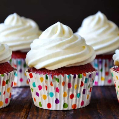 Red Velvet Cupcakes with Piped Cream Cheese Frosting from justataste.com #recipe