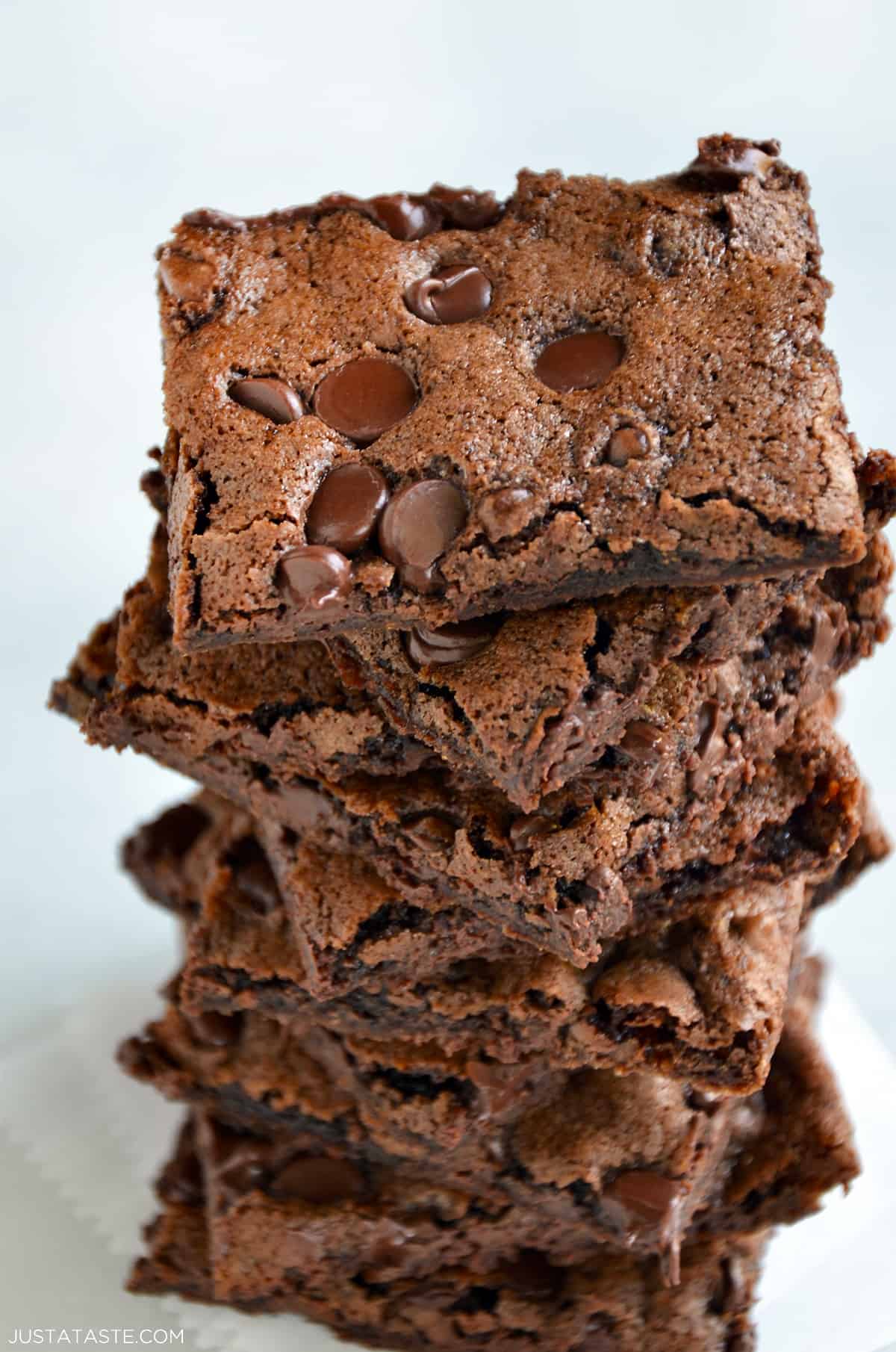 A stack of chocolate chip studded brownie bark. 