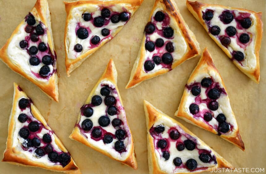 Top-down view of Cream Cheese Pastries topped with juicy blueberries