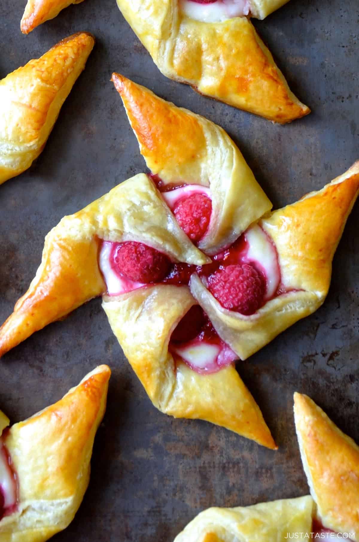 A golden brown Raspberry Cream Cheese Pinwheel Pastry.