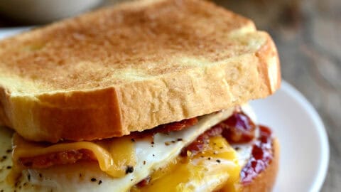 The ultimate breakfast sandwich with two fried eggs, crispy bacon, cheddar cheese and strawberry jam.