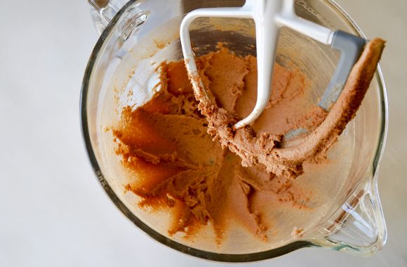 Butter, cinnamon and sugar in a glass mixing bowl