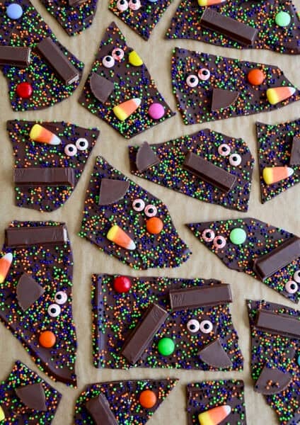 Halloween chocolate bark with leftover Halloween pieces and bloodshot candy eyes.