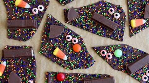 Halloween chocolate bark with leftover Halloween pieces and bloodshot candy eyes.