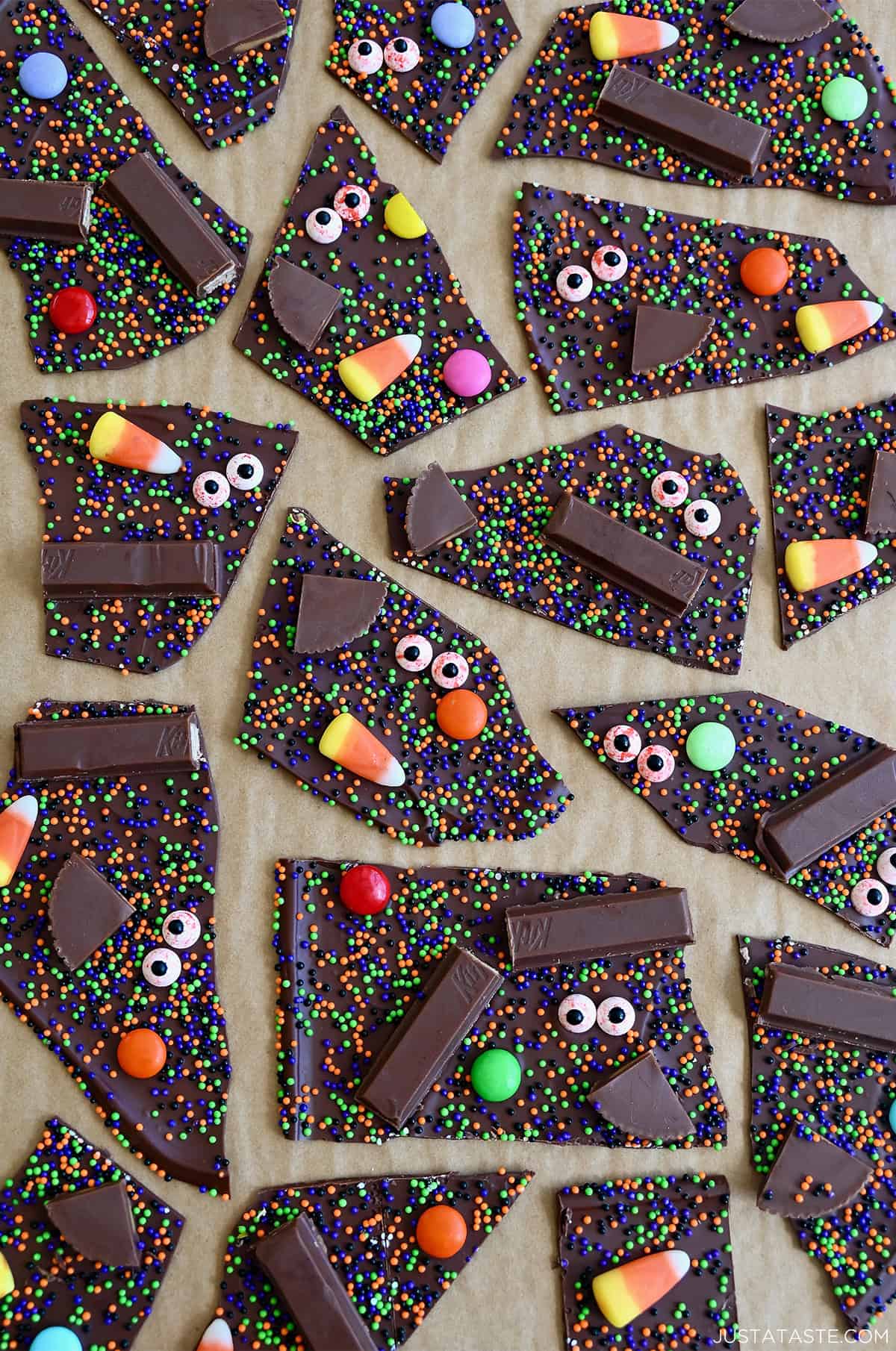 Halloween chocolate bark with leftover Halloween pieces and bloodshot candy eyes.