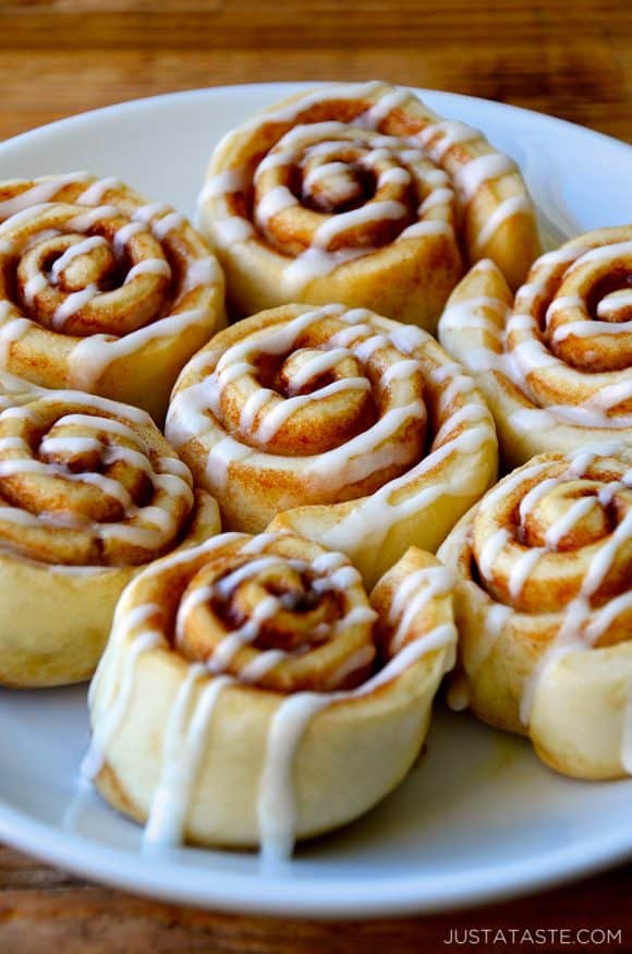 Pizza Dough Cinnamon Rolls with glaze on serving plate