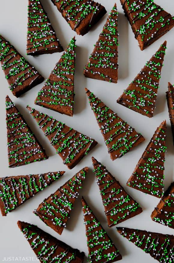 A view of Christmas Brownies drizzled with chocolate and topped with sprinkles