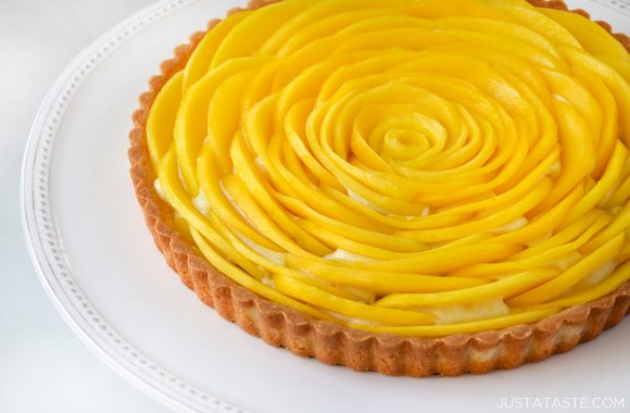 The best mango tart on white serving plate 
