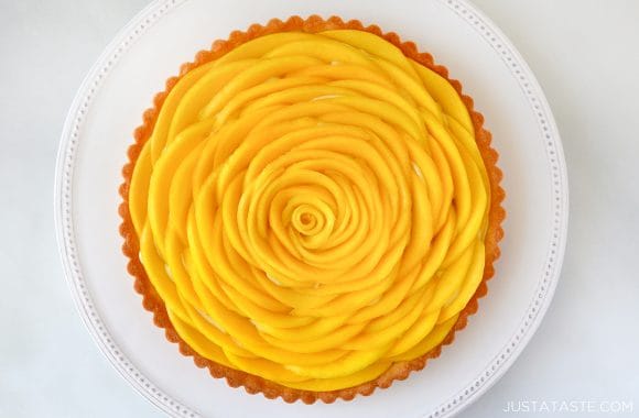 Top down view of mango topped tart with easy vanilla pastry cream