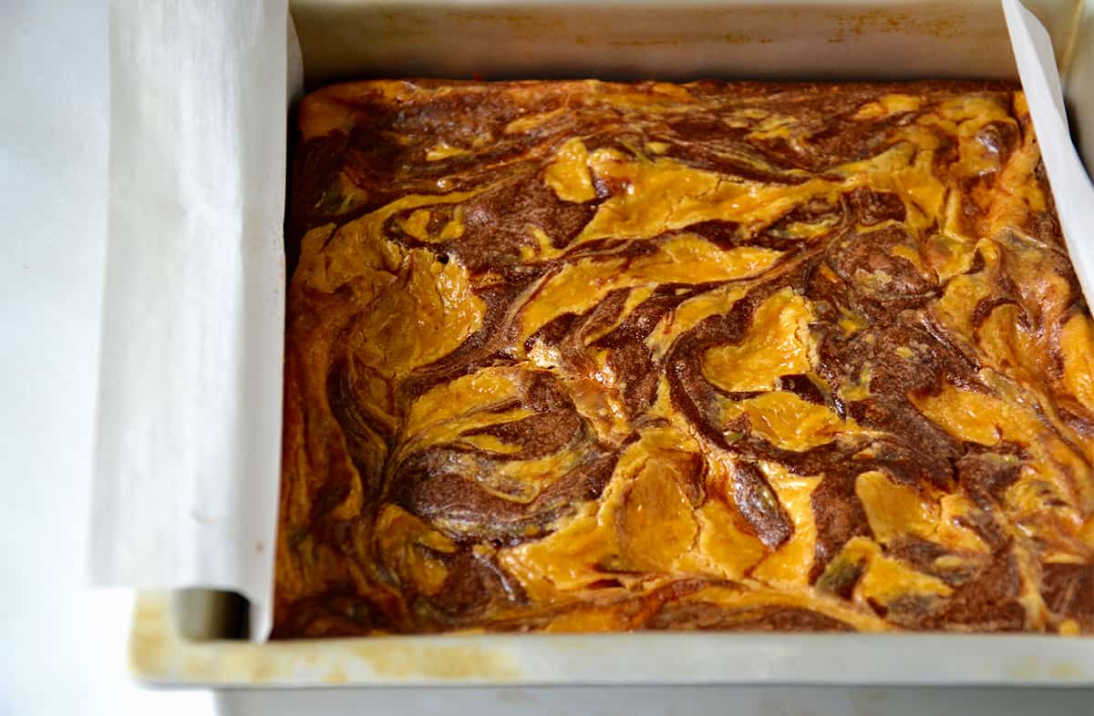 Fudgy butterscotch brownies in a square pan.