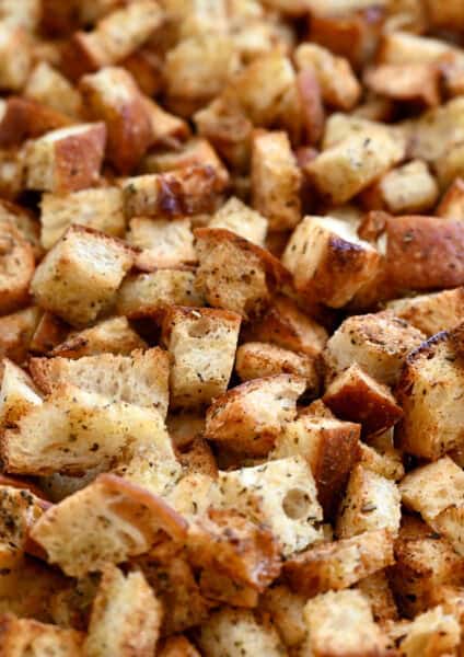A close-up view of cubed homemade croutons.