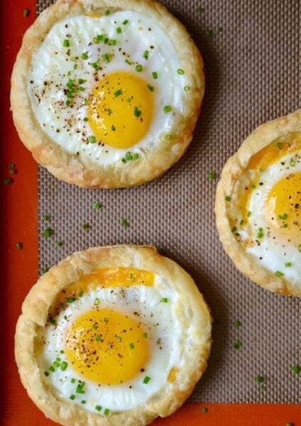 Cheesy Puff Pastry Baked Eggs recipe from justataste.com