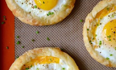 Cheesy Puff Pastry Baked Eggs recipe from justataste.com