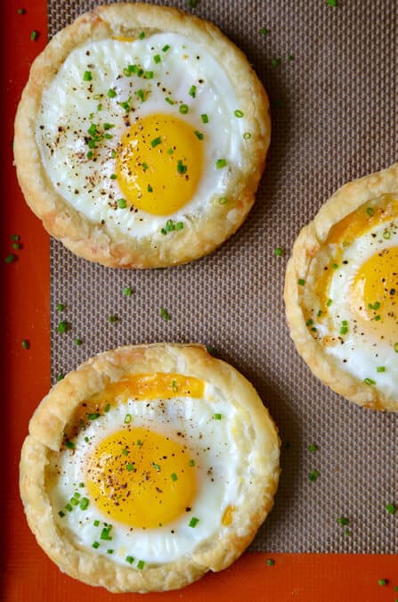 Cheesy Puff Pastry Baked Eggs recipe from justataste.com