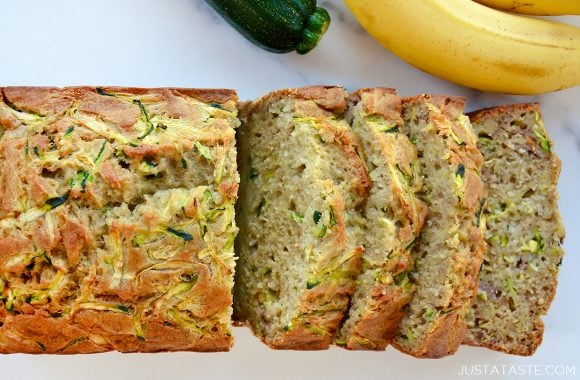 A half sliced loaf of the best Zucchini Banana Bread