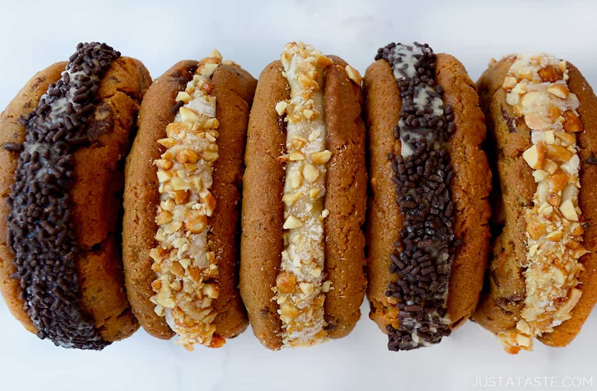 A row of peanut butter cookie banana "nice" cream sandwiches.