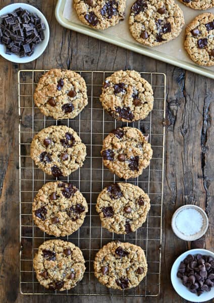 A top-down view of soft and chewy Flourless Oatmeal Chocolate Chip Cookies cooling on a wire rack