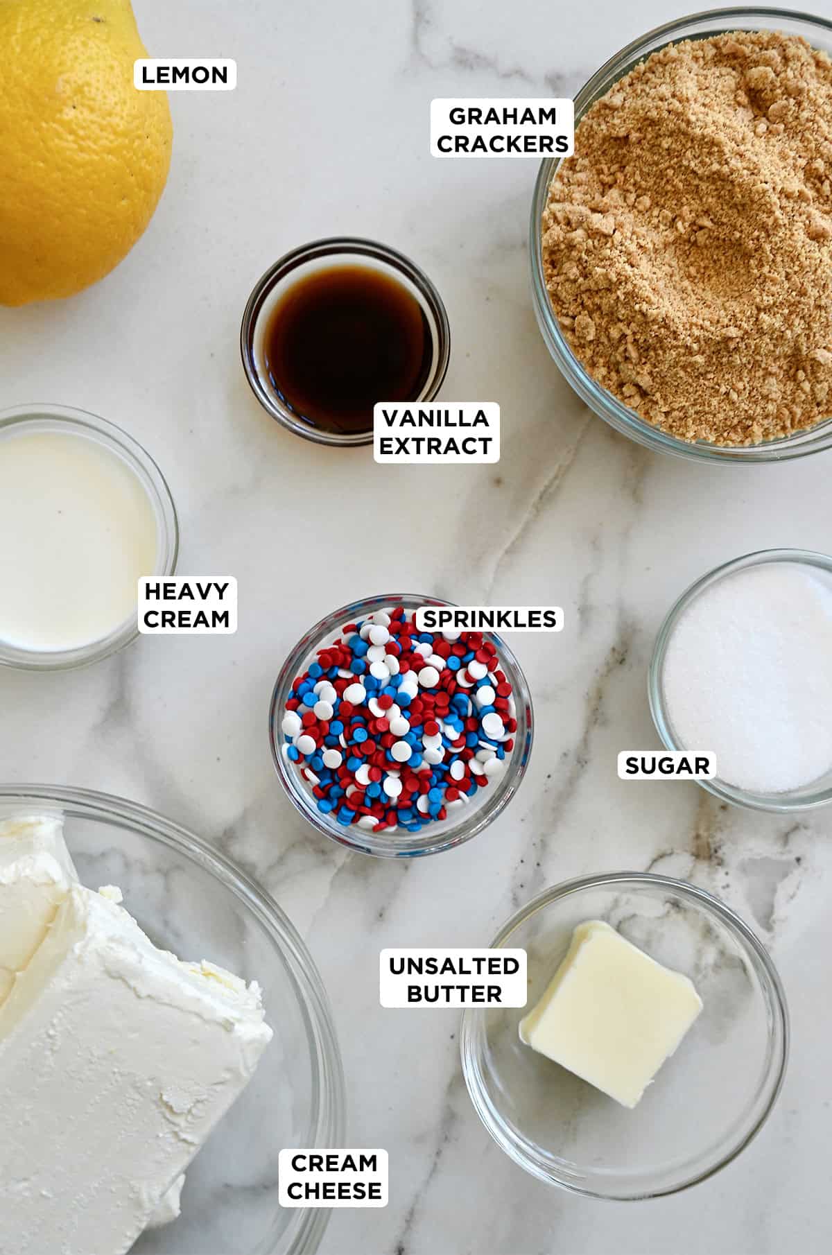 Ingredients to make Fourth of July no-bake cheesecake parfaits.