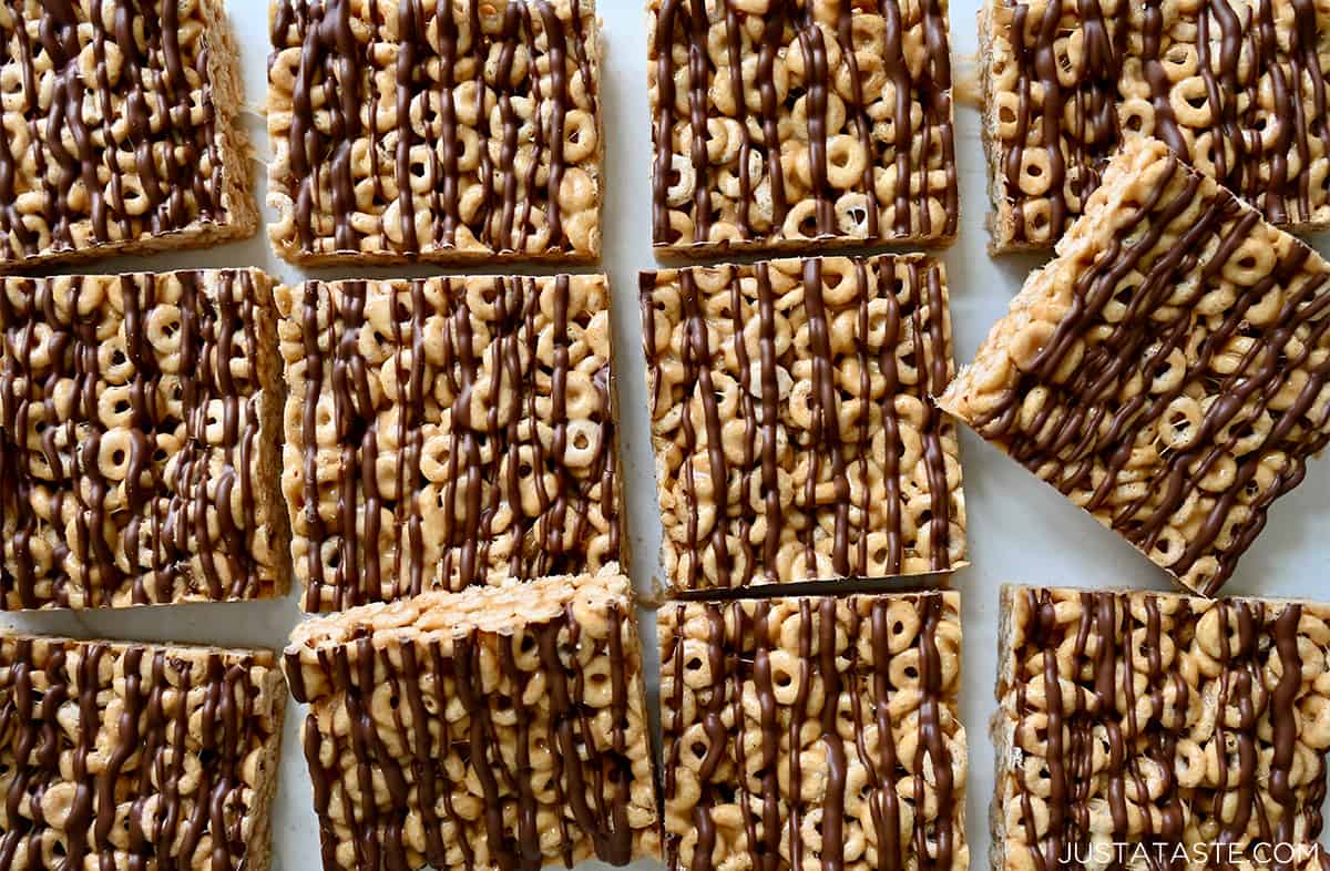 Peanut butter Cheerios bars drizzled with chocolate and cut into perfect squares.