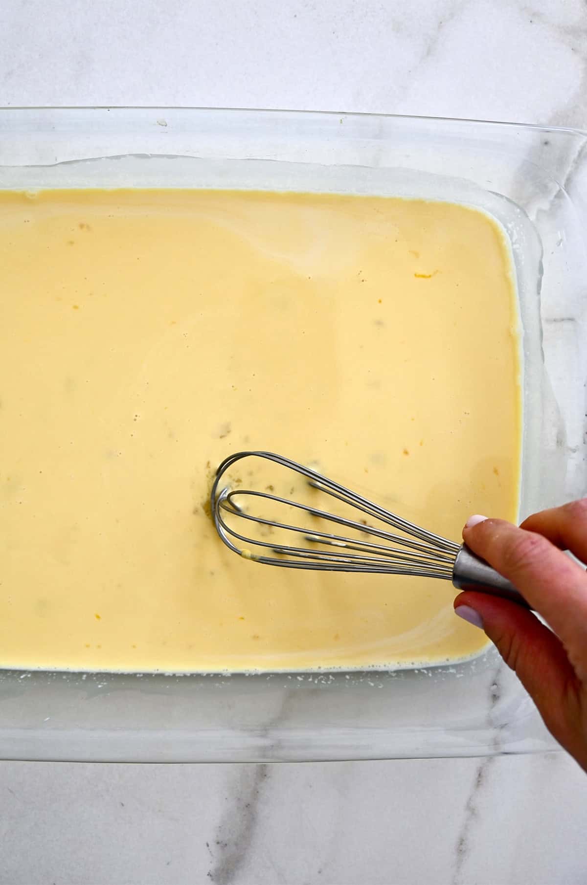 Vanilla custard for making French toast in a 9x13 dish.